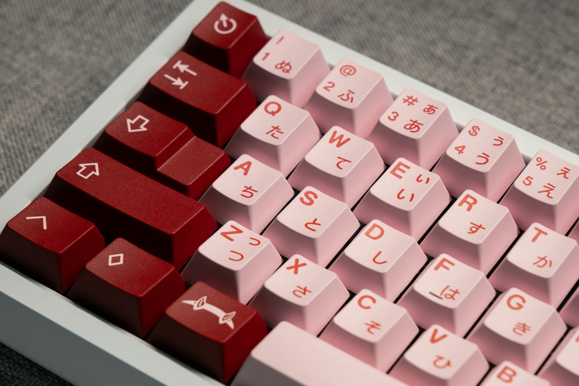 a close up of a red and white keyboard